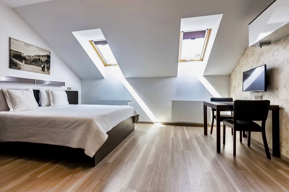 A cozy attic studio in Prague's Vinohrady district. Enjoy the comfort of an aparthotel at Vinohradský dům. Book now for a memorable stay!